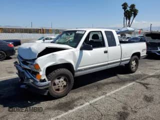 1995 Chevrolet Silverado 1500 z VIN 2GCEK19K7S1186881, wystawiony jako Copart lot #70372165 z przebiegiem 151 650 mil mil oraz Szkoda całkowita • Salvage title. Historia ofert i sprzedaży dostępna na DreamBid. Obrazek 1.