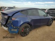 ✅ 2022 Tesla Model Y Performance • VIN: 7SAYGDEFXNF539871 • Lot: 90124115. Listed on Copart with 38,046 mi. Free auction sales archive from the USA and detailed vehicle history report at DreamBid. Image 3.