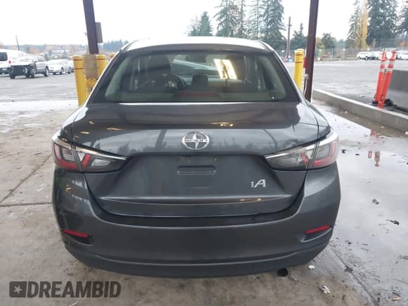 ✅ 2016 Scion iA • VIN: 3MYDLBZVXGY144269 • Lot: 43668452. Listed on IAAI with Not provided. Free auction sales archive from the USA and detailed vehicle history report at DreamBid. Image 16.