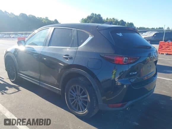 ✅ 2019 Mazda CX-5 Sport • VIN: JM3KFABMXK1552901 • Lot: 43104258. Listed on IAAI with 104,368 mi. Free auction sales archive from the USA and detailed vehicle history report at DreamBid. Image 3.