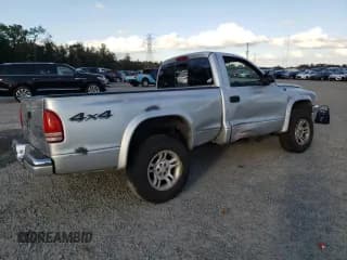 ✅ 2003 Dodge Dakota • VIN: 1D7GG16X33S130101 • Lot: 85999314. Wystawiony na Copart z przebiegiem 221 292 mil. Bezpłatny archiwum sprzedaży aukcyjnych z USA i szczegółowy raport historii pojazdu na DreamBid. Zdjęcie 3.