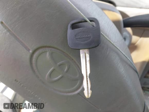 ✅ 1999 Toyota Corolla VE • VIN: 1NXBR12E2XZ214726 • Lot: 43005806. Listed on IAAI with 295,368 mi. Free auction sales archive from the USA and detailed vehicle history report at DreamBid. Image 11.