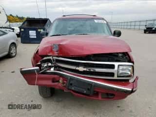 1997 Chevrolet Blazer LS z VIN 1GNDT13WXV2180296, wystawiony jako Copart lot #75976434 z przebiegiem 85 247 mil mil oraz Szkoda całkowita • Salvage title. Historia ofert i sprzedaży dostępna na DreamBid. Obrazek 5.