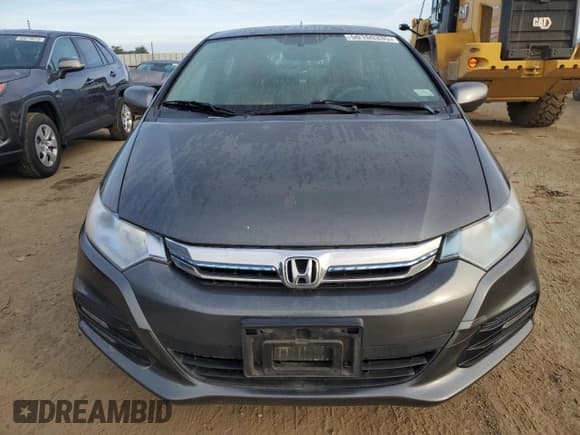 ✅ 2012 Honda Insight • VIN: JHMZE2H32CS000284 • Lot: 50160335. Listed on Copart with 64,074 mi. Free auction sales archive from the USA and detailed vehicle history report at DreamBid. Image 5.