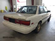 ✅ 1987 Toyota Camry LE • VIN: JT2SV22E3H3012242 • Lot: 42526925. Wystawiony na IAAI z przebiegiem 191 564 mil. Bezpłatny archiwum sprzedaży aukcyjnych z USA i szczegółowy raport historii pojazdu na DreamBid. Zdjęcie 4.
