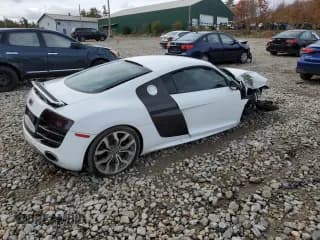 ✅ 2010 Audi R8 5.2L • VIN: WUAANAFG9AN001607 • Lot: 76276144. Wystawiony na Copart z przebiegiem 68 700 mil. Bezpłatny archiwum sprzedaży aukcyjnych z USA i szczegółowy raport historii pojazdu na DreamBid. Zdjęcie 3.
