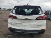✅ 2022 Chevrolet Equinox LT • VIN: 3GNAXUEV9NS103694 • Lot: 65503725. Wystawiony na Copart z przebiegiem 62 567 mil. Bezpłatny archiwum sprzedaży aukcyjnych z USA i szczegółowy raport historii pojazdu na DreamBid. Zdjęcie 6.