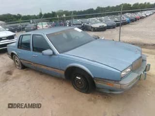 ✅ 1990 Cadillac Seville • VIN: 1G6KS5336LU821075 • Lot: 42932863. Wystawiony na IAAI z przebiegiem 127 845 mil. Bezpłatny archiwum sprzedaży aukcyjnych z USA i szczegółowy raport historii pojazdu na DreamBid. Zdjęcie 1.