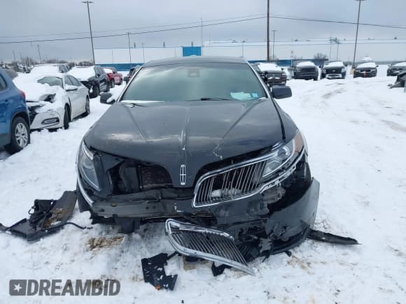 ✅ 2013 Lincoln MKS EcoBoost • VIN: 1LNHL9FT7DG604069 • Lot: 41362256. Listed on IAAI with 92,789 mi. Free auction sales archive from the USA and detailed vehicle history report at DreamBid. Image 12.