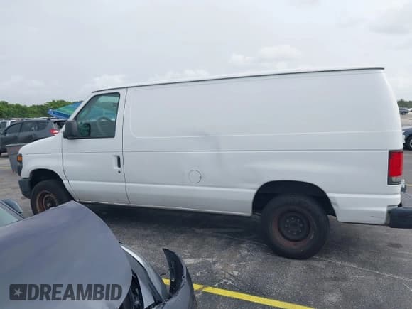 ✅ 2013 Ford Econoline Cargo Commercial • VIN: 1FTNE1EW1DDA90039 • Lot: 42439049. Listed on IAAI with 218,937 mi. Free auction sales archive from the USA and detailed vehicle history report at DreamBid. Image 14.