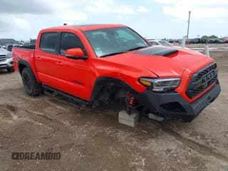 ✅ 2023 Toyota Tacoma SR • VIN: 3TYCZ5AN0PT157498 • Lot: 42499193. Listed on IAAI with 19,070 mi. Free auction sales archive from the USA and detailed vehicle history report at DreamBid. Image 1.