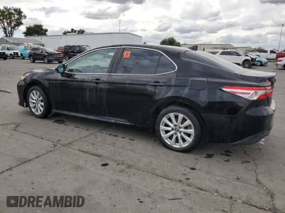 2019 Toyota Camry LE с VIN 4T1B11HK1KU250470, выставлен на аукционе Copart как лот 71716865 с пробегом 132 733 миль миль и Чистый • Clean title. История ставок и продаж доступна на DreamBid. Изображение 2.