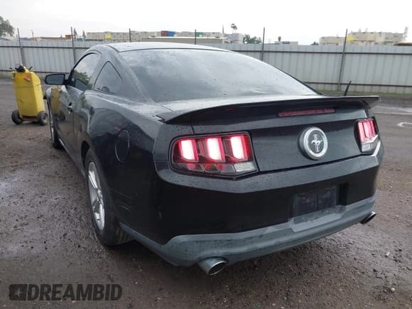 ✅ 2012 Ford Mustang Premium • VIN: 1ZVBP8AM4C5222131 • Lot: 43519035. Listed on IAAI with 124,983 mi. Free auction sales archive from the USA and detailed vehicle history report at DreamBid. Image 3.