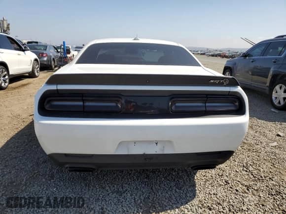 2021 Dodge Challenger SRT Hellcat with VIN 2C3CDZC93MH599434, listed as a Copart auction lot 54878345 with 16,554 mi miles and Salvage title. Bid and sale history available at DreamBid. Image 6.