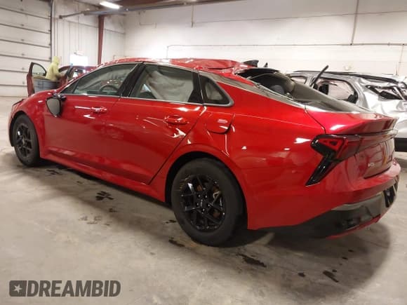 ✅ 2025 Kia K5 LXS • VIN: KNAG24J7XS5283344 • Lot: 41830126. Listed on IAAI with 13,607 mi. Free auction sales archive from the USA and detailed vehicle history report at DreamBid. Image 3.