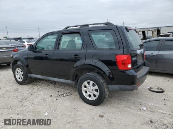 ✅ 2009 Mazda Tribute Touring • VIN: 4F2CZ02739KM03047 • Lot: 43086245. Wystawiony na Copart z przebiegiem 164 566 mil. Bezpłatny archiwum sprzedaży aukcyjnych z USA i szczegółowy raport historii pojazdu na DreamBid. Zdjęcie 2.