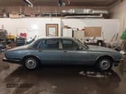 ✅ 1992 Jaguar XJ • VIN: SAJKY1745NC649347 • Lot: 41523718. Listed on IAAI with 159,926 mi. Free auction sales archive from the USA and detailed vehicle history report at DreamBid. Image 13.