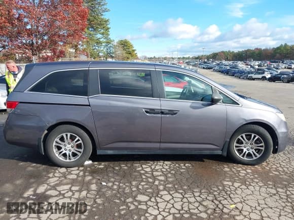 ✅ 2015 Honda Odyssey LX • VIN: 5FNRL5H25FB094386 • Lot: 43683126. Listed on IAAI with 198,519 mi. Free auction sales archive from the USA and detailed vehicle history report at DreamBid. Image 13.