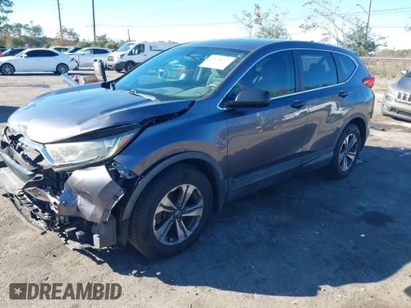 ✅ 2017 Honda CR-V LX • VIN: 7FARW5H39HE013624 • Lot: 43678617. Listed on IAAI with 126,470 mi. Free auction sales archive from the USA and detailed vehicle history report at DreamBid. Image 2.
