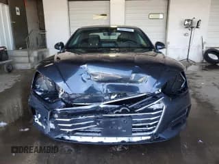 ✅ 2018 Audi A5 Premium Plus • VIN: WAUPNAF51JA005578 • Лот: 90934455. Опубликован ранее на Copart с пробегом 85 881 миль. Бесплатный доступ к архиву аукционных продаж из США и подробный отчёт об истории автомобиля на DreamBid. Изображение 5.