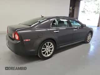 2011 Chevrolet Malibu LTZ z VIN 1G1ZE5E1XBF221072, wystawiony jako Copart lot #70138685 z przebiegiem 144 337 mil mil oraz Czysty tytuł • Clean title. Historia ofert i sprzedaży dostępna na DreamBid. Obrazek 3.