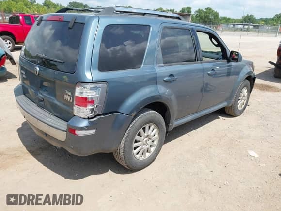 2011 Mercury Mariner Premier z VIN 4M2CN9HG8BKJ00403, wystawiony jako IAAI lot #42623296 z przebiegiem 197 304 mil mil oraz . Historia ofert i sprzedaży dostępna na DreamBid. Obrazek 4.