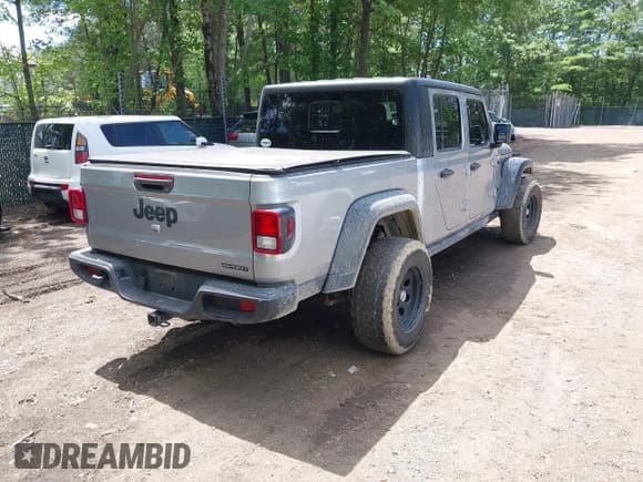 ✅ 2020 Jeep Gladiator Sport S • VIN: 1C6HJTAGXLL199209 • Lot: 42186918. Wystawiony na IAAI z przebiegiem 126 853 mil. Bezpłatny archiwum sprzedaży aukcyjnych z USA i szczegółowy raport historii pojazdu na DreamBid. Zdjęcie 4.