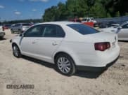 ✅ 2010 Volkswagen Jetta S • VIN: 3VWJX7AJ3AM075822 • Lot: 71417695. Listed on Copart with 214,784 mi. Free auction sales archive from the USA and detailed vehicle history report at DreamBid. Image 2.