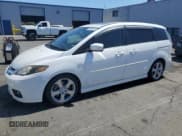 ✅ 2007 Mazda 5 Touring • VIN: JM1CR29L570136131 • Lot: 69250035. Wystawiony na Copart z przebiegiem 218 651 mil. Bezpłatny archiwum sprzedaży aukcyjnych z USA i szczegółowy raport historii pojazdu na DreamBid. Zdjęcie 1.