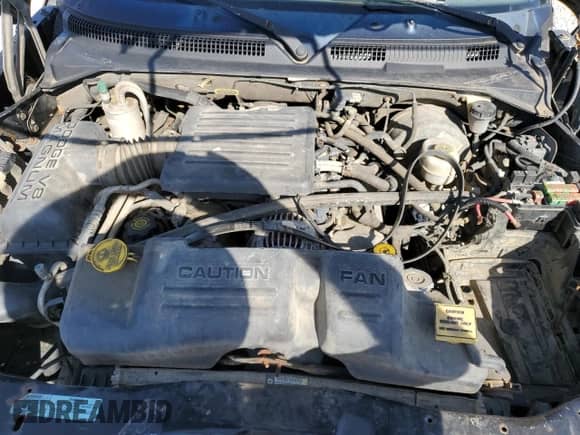 2000 Dodge Dakota Sport z VIN 1B7GG26N7YS667611, wystawiony jako Copart lot #71181355 z przebiegiem 218 471 mil mil oraz Szkoda całkowita • Salvage title. Historia ofert i sprzedaży dostępna na DreamBid. Obrazek 11.