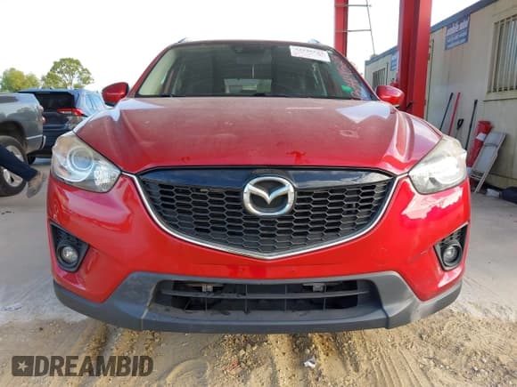 ✅ 2014 Mazda CX-5 Grand Touring • VIN: JM3KE4DY3E0424708 • Lot: 43349523. Wystawiony na IAAI z przebiegiem 75 283 mil. Bezpłatny archiwum sprzedaży aukcyjnych z USA i szczegółowy raport historii pojazdu na DreamBid. Zdjęcie 13.