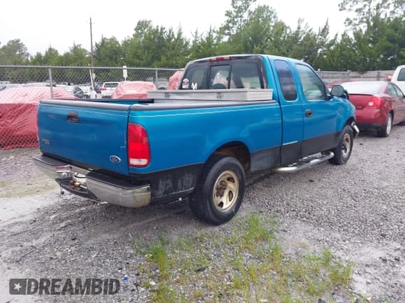 ✅ 1998 Ford F-150 • VIN: 1FTZX172XWNA93590 • Lot: 42630006. Listed on IAAI with 180,178 mi. Free auction sales archive from the USA and detailed vehicle history report at DreamBid. Image 4.