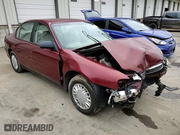 2003 Chevrolet Malibu with VIN 1G1ND52J13M696712, listed as a Copart auction lot 86052984 with 81,635 mi miles and Salvage title. Bid and sale history available at DreamBid. Image 11.