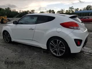 ✅ 2016 Hyundai Veloster Turbo • VIN: KMHTC6AE3GU272509 • Lot: 65196394. Listed on Copart with 90,917 mi. Free auction sales archive from the USA and detailed vehicle history report at DreamBid. Image 2.