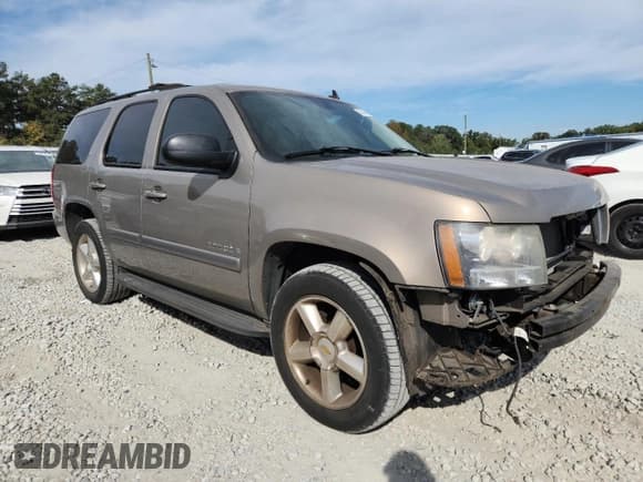 ✅ 2007 Chevrolet Tahoe LTZ • VIN: 1GNFC13057R257185 • Lot: 82646025. Listed on Copart with 166,456 mi. Free auction sales archive from the USA and detailed vehicle history report at DreamBid. Image 4.