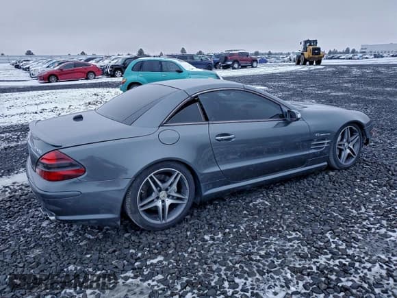 ✅ 2004 Mercedes-Benz SL 55/63 AMG • VIN: WDBSK74F24F065394 • Лот: 94816755. Опубликован ранее на Copart с пробегом Не указан. Бесплатный доступ к архиву аукционных продаж из США и подробный отчёт об истории автомобиля на DreamBid. Изображение 3.