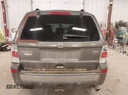 ✅ 2010 Mercury Mariner Premier • VIN: 4M2CN9HGXAKJ11983 • Lot: 41512060. Listed on IAAI with 154,971 mi. Free auction sales archive from the USA and detailed vehicle history report at DreamBid. Image 16.