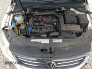 ✅ 2012 Volkswagen CC Lux • VIN: WVWHP7AN6CE528683 • Lot: 66880725. Listed on Copart with 148,758 mi. Free auction sales archive from the USA and detailed vehicle history report at DreamBid. Image 11.