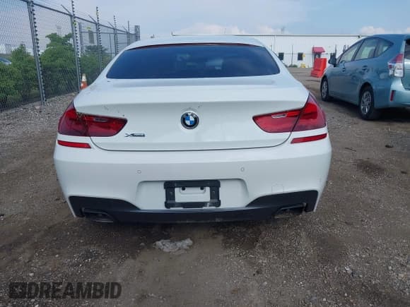 ✅ 2015 BMW 6 Series 650i xDrive • VIN: WBA6B4C5XFD761569 • Lot: 42646861. Listed on IAAI with 55,306 mi. Free auction sales archive from the USA and detailed vehicle history report at DreamBid. Image 16.
