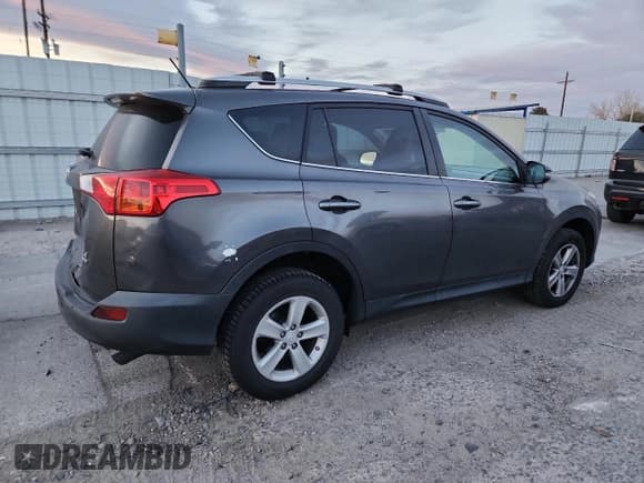 ✅ 2013 Toyota RAV4 XLE • VIN: 2T3RFREV4DW074943 • Лот: 90750035. Опубликован ранее на Copart с пробегом 142 586 миль. Бесплатный доступ к архиву аукционных продаж из США и подробный отчёт об истории автомобиля на DreamBid. Изображение 3.