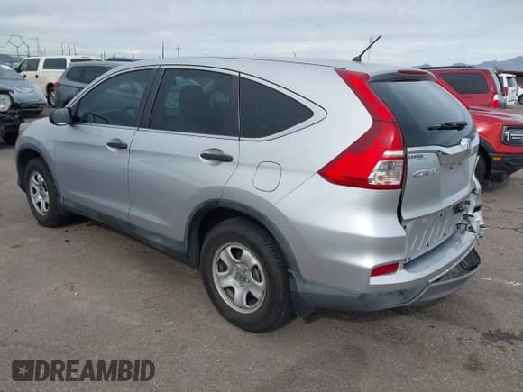 ✅ 2016 Honda CR-V LX • VIN: 2HKRM3H33GH570213 • Lot: 43770633. Listed on IAAI with 101,956 mi. Free auction sales archive from the USA and detailed vehicle history report at DreamBid. Image 3.