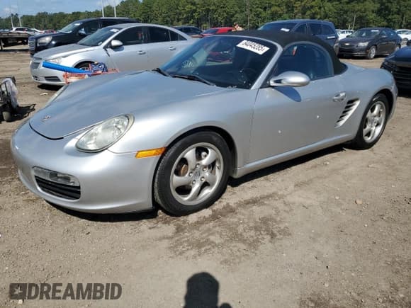 ✅ 2007 Porsche Boxster • VIN: WP0CA29877U710451 • Lot: 84045285. Listed on Copart with 114,749 mi. Free auction sales archive from the USA and detailed vehicle history report at DreamBid. Image 1.