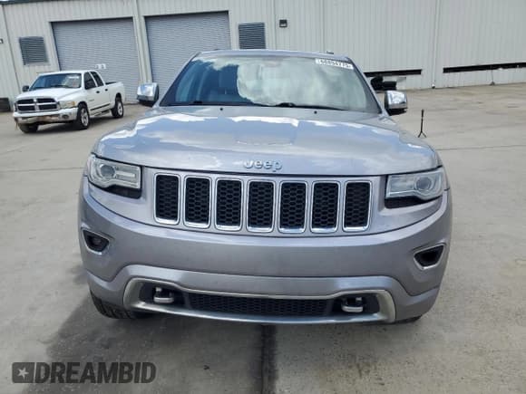 ✅ 2014 Jeep Grand Cherokee Overland • VIN: 1C4RJFCG5EC210163 • Lot: 68894775. Listed on Copart with 205,339 mi. Free auction sales archive from the USA and detailed vehicle history report at DreamBid. Image 5.