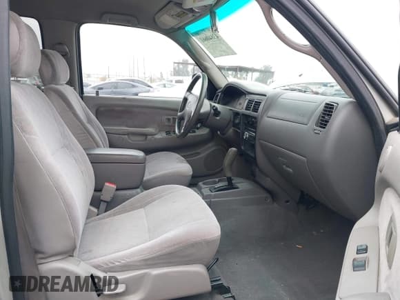 ✅ 2001 Toyota Tacoma PreRunner • VIN: 5TEGN92N51Z765722 • Lot: 43840661. Listed on IAAI with 205,791 mi. Free auction sales archive from the USA and detailed vehicle history report at DreamBid. Image 5.