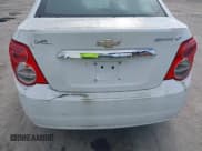 ✅ 2014 Chevrolet Sonic LT • VIN: 1G1JC5SH2E4218784 • Lot: 43681550. Listed on IAAI with 104,015 mi. Free auction sales archive from the USA and detailed vehicle history report at DreamBid. Image 13.