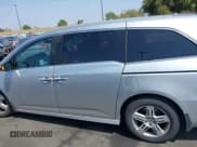 ✅ 2012 Honda Odyssey Touring • VIN: 5FNRL5H91CB004546 • Lot: 42175002. Listed on IAAI with 118,719 mi. Free auction sales archive from the USA and detailed vehicle history report at DreamBid. Image 14.