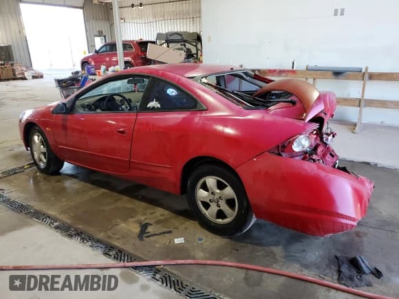 ✅ 1999 Mercury Cougar • VIN: 1ZWFT61LXX5622317 • Lot: 78069784. Listed on Copart with 188,997 mi. Free auction sales archive from the USA and detailed vehicle history report at DreamBid. Image 2.