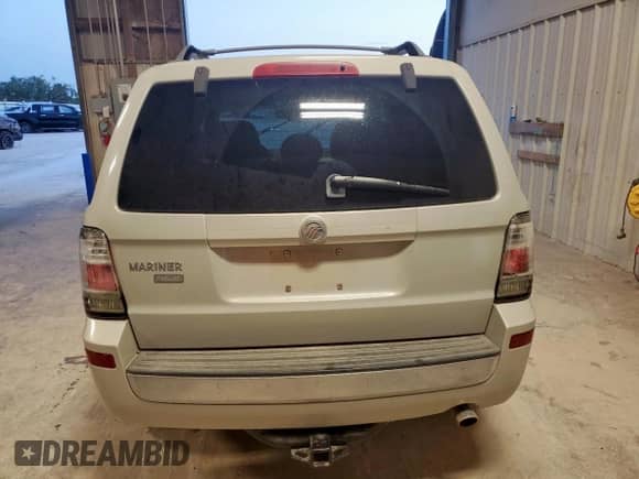 2009 Mercury Mariner Premier с VIN 4M2CU87769KJ12378, выставлен на аукционе Copart как лот 69630725 с пробегом 67 949 миль миль и На запчасти • Non repairable. История ставок и продаж доступна на DreamBid. Изображение 6.