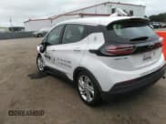 ✅ 2023 Chevrolet Bolt EV 1LT • VIN: 1G1FW6S03P4120721 • Lot: 43049889. Listed on IAAI with 31,128 mi. Free auction sales archive from the USA and detailed vehicle history report at DreamBid. Image 3.