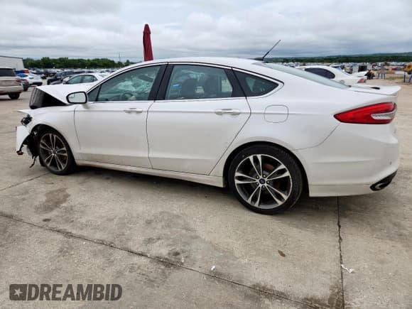 ✅ 2018 Ford Fusion Titanium • VIN: 3FA6P0K96JR109412 • Lot: 60421195. Listed on Copart with 120,857 mi. Free auction sales archive from the USA and detailed vehicle history report at DreamBid. Image 2.